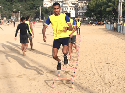 Agility hurdles drills at beach